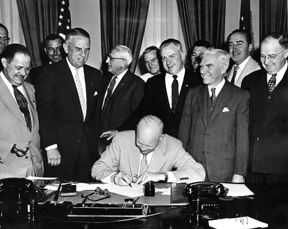 President Eisenhower signing HR7786, changing Armistice Day to Veterans Day.