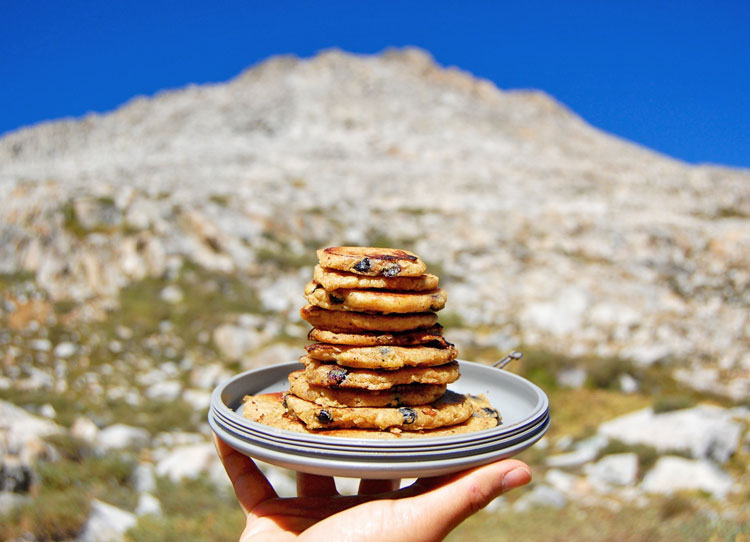 Adding water to Blueberry Cornmeal Pancake Tall Stack