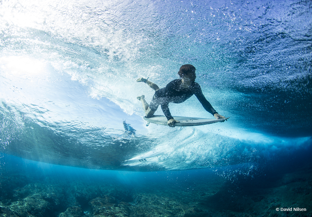 Today’s Photo Of The Day is “Duck Dive at Cloudbreak” by David Nilsen. Location: Fiji.